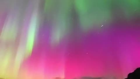 Arctic photo guide/ Aurora expert, Dave Williams the Northern Lights in Lofoten, Norway.