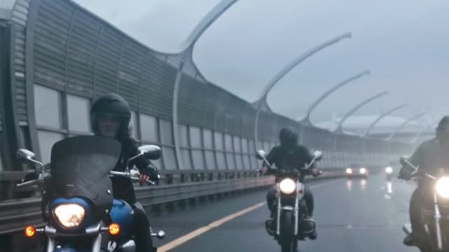 Motorcycle Riding On A Rainy Day