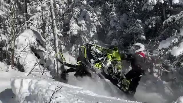Guys Struggle To Get Snowmobile Out of Deep Snow