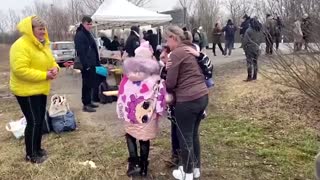 Mother reunites with children at Ukraine border