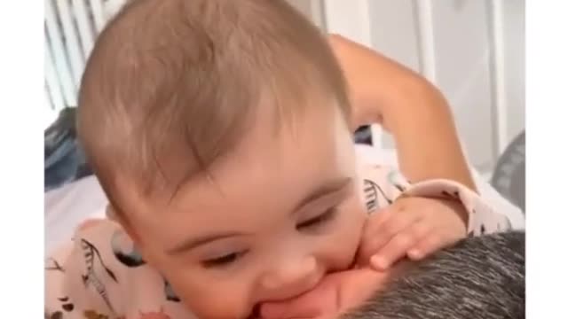 cute baby bite daddy ear.mp4