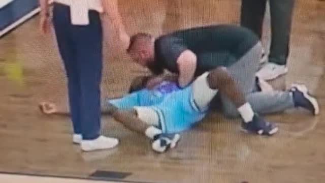 Another young healthy athlete falls suddenly while holding his chest