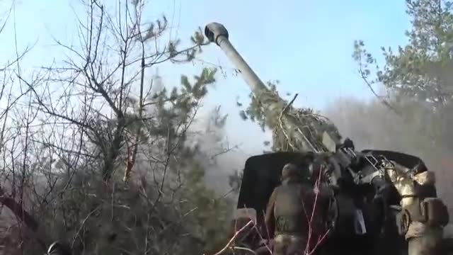 Gunners of the Russian Armed Forces support DPR fighters with 2A65 "Msta-B" howitzers