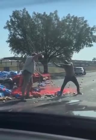 Black Man looting potatoes in South Africa