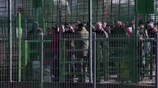 'It's hard to process': Ukrainians flee to Poland