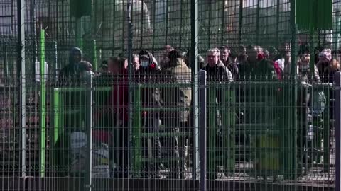 'It's hard to process': Ukrainians flee to Poland