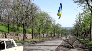 People line up for pensions in Mariupol