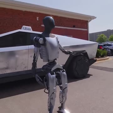 Tesla Robot Driving a Cybertruck for Uber