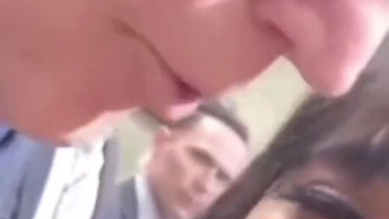 Biden caught close up on camera sniffing young girl.