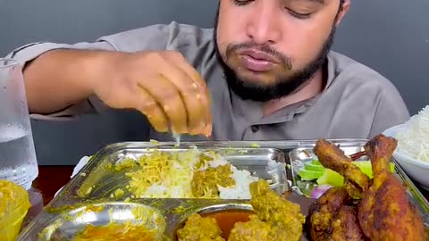 Full Chicken Curry With Rice Eating show