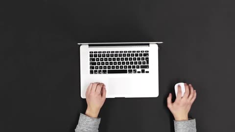 Hands Typing On Laptop