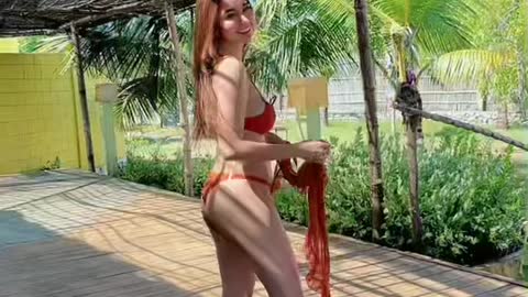 Flexing her bikini sexy dancing