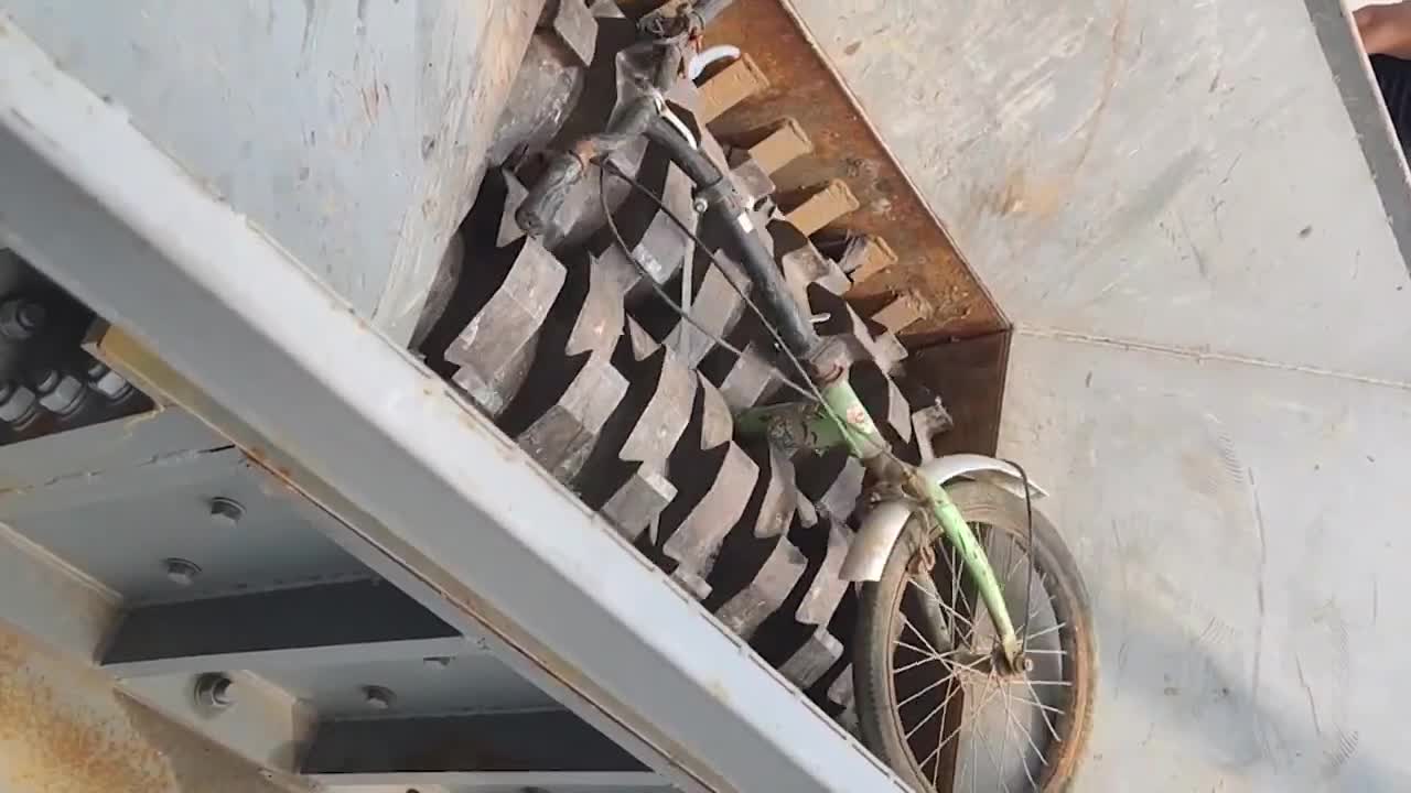 What happens when you throw the iron block into the shredder_