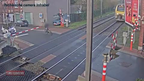 Man on a BIKE thought he could BEAT THE TRAIN. Close!🚲💥🚄