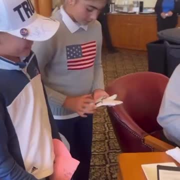 Donald J Trump signing golf gloves for the kids Jan 15th, 2023