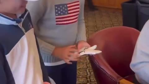 Donald J Trump signing golf gloves for the kids Jan 15th, 2023