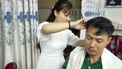 Men's haircuts and facial shaves with beautiful girls at Vietnam Barbershop