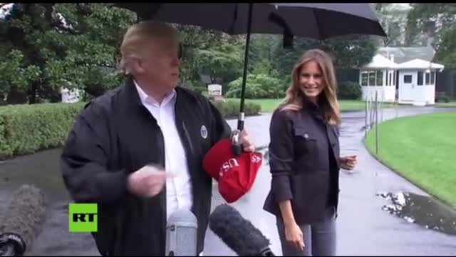 TrumpLeftMelania Alone in Rain Without Umbrella