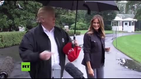 TrumpLeftMelania Alone in Rain Without Umbrella