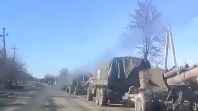 Artillery column of the Russian army in the village Volchansk (Kharkov region)