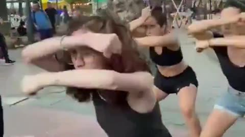 Liberal women in Argentina do some kind of dance to protest Trump and Milei