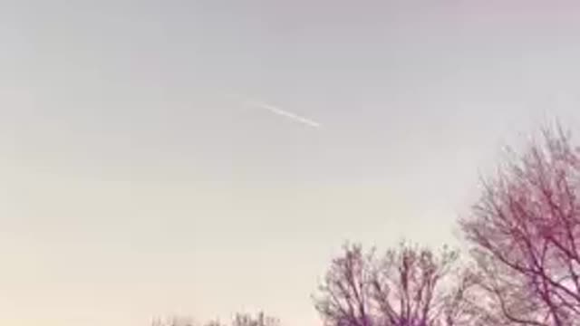 Fighter jets fly over