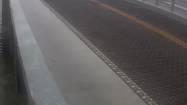 This motorcyclist in Florida tried to beat a rising drawbridge