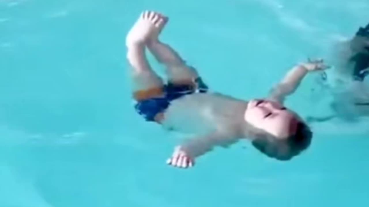 boy dancing in the water