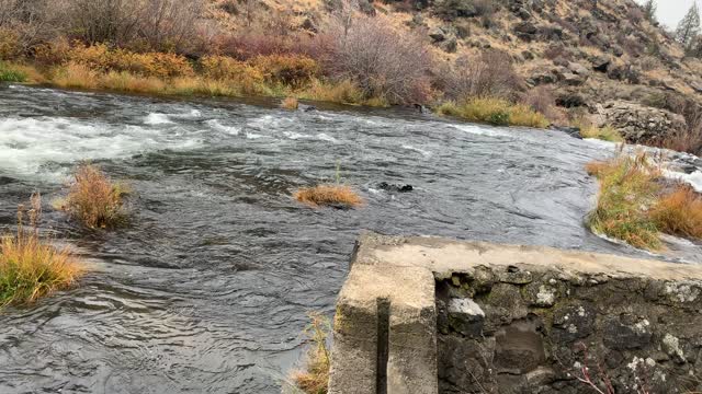 Central Oregon – Steelhead Falls – Walking Down Ledge Overlooking River – 4K