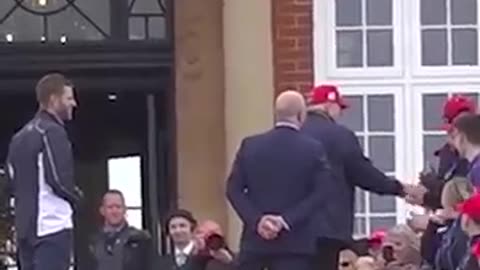 Donald Trump greeted by red cap-waving staff as he arrives at his Turnberry golf resort in Scotland