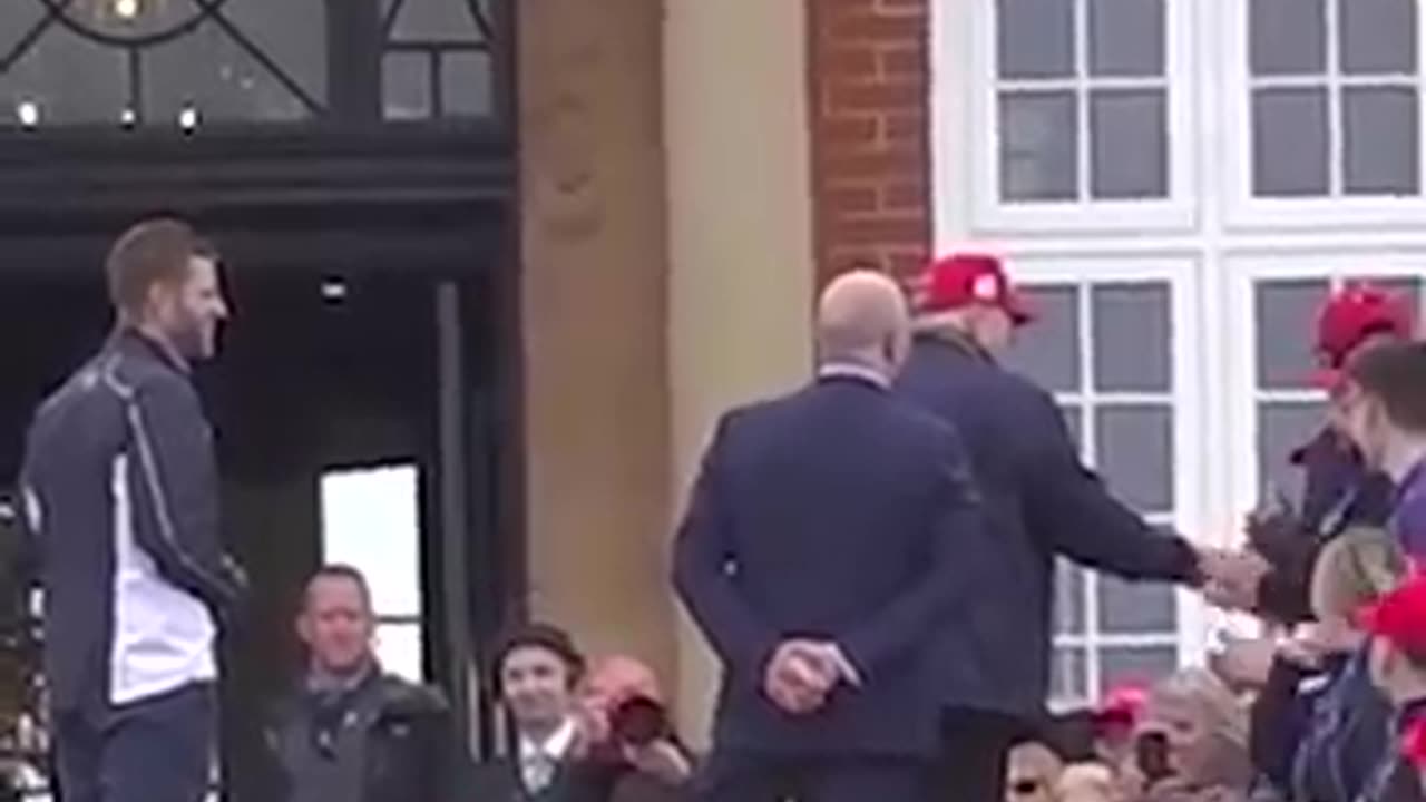 Donald Trump greeted by red cap-waving staff as he arrives at his Turnberry golf resort in Scotland