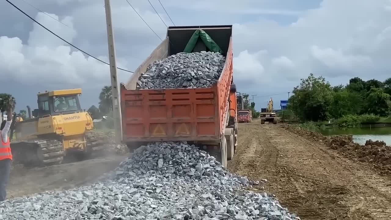 New bulldozer spreading gravel processing features building road foundation-7