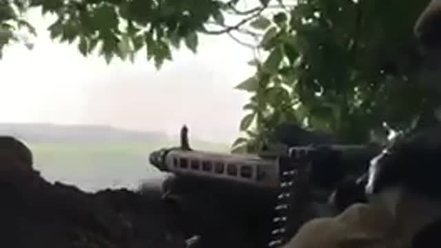 Soldier shooting in Donbass with an MG 3 machine gun