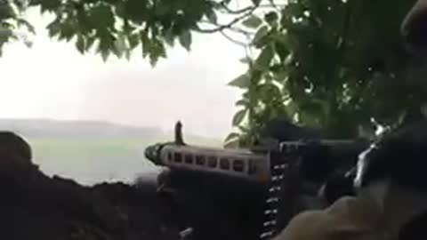 Soldier shooting in Donbass with an MG 3 machine gun