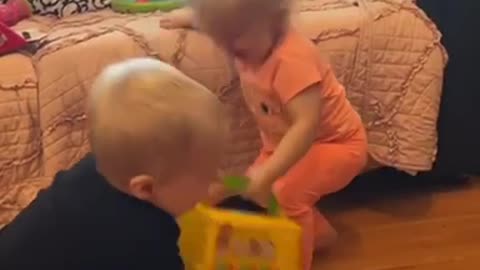 Overdramatic Toddler Fights Over Toys | LADbible