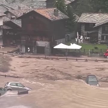 Cars washed down road as huge floods hit Italy and Switzerland