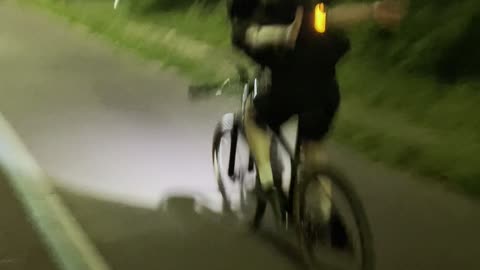 ninja is riding a bike