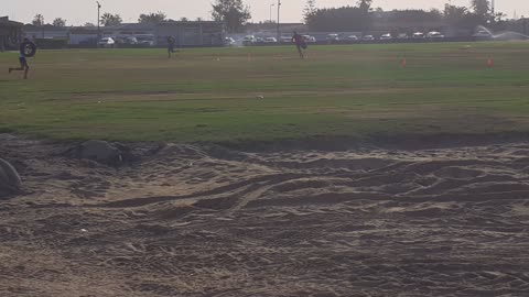 Intense Local Rugby Team Training: Tire Carrying Races for Ultimate Fitness!
