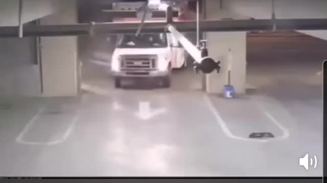 U HAUL DRIVES INTO PARKING DECK