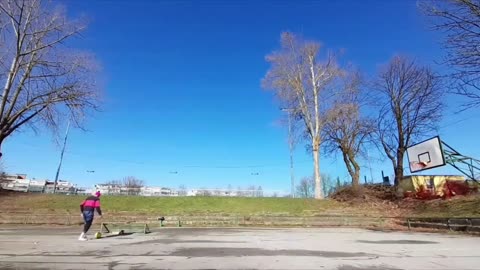 Guy Pulls Befire Trickshot in to Basketball Hoop