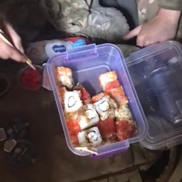 Ukrainians Get Sushi Delivered to the Trenches