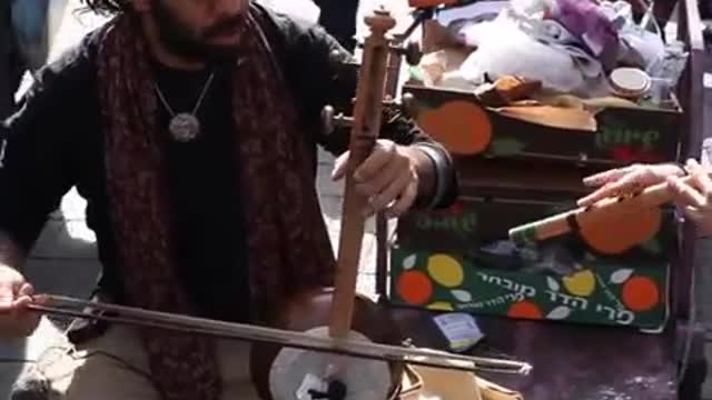 cultures from around the world - Israeli kamancheh player at market, Jerusalem, Israel Episode 2