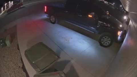 Man Gets Squashed Against Garage Door After Forgetting to Put Truck in Park Mode