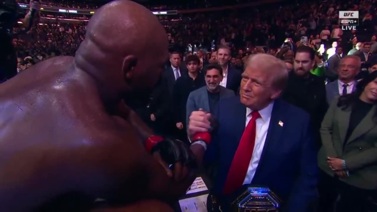 Jon Jones just won his UFC match and gave the championship belt to Trump