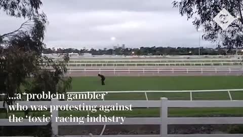 Protester dumps '1,000 litres of oily sludge' onto Melbourne Cup course