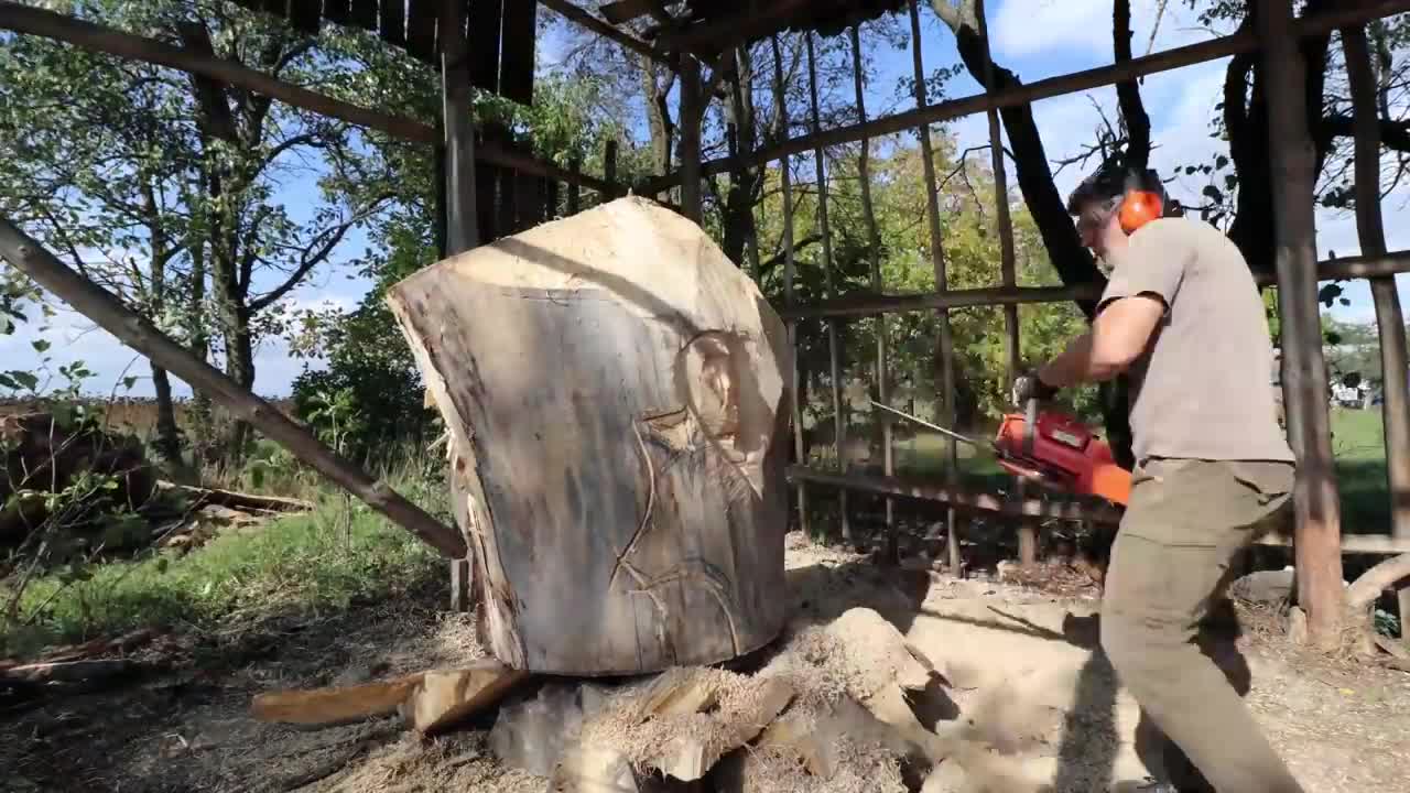 AMAZING CHAINSAW wood carving, Native American with wolves