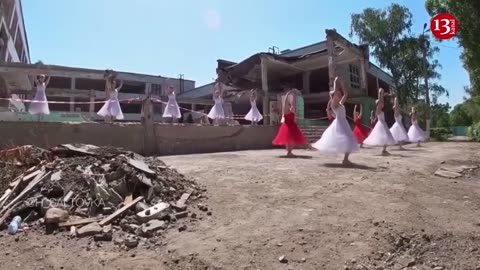 Graduation waltz against backdrop of a school destroyed by shelling in Kharkov