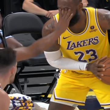 LeBron James gets eye poked and flops around like a soccer player
