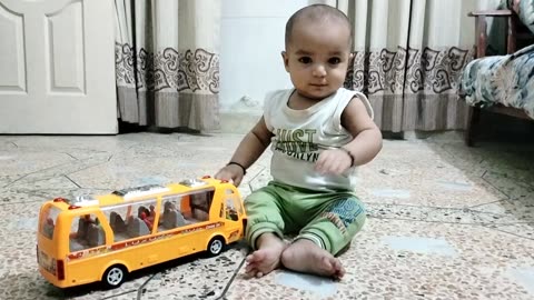 ahil is playing with the bus and having fun ❤️❤️❤️