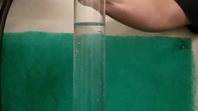 Fast Spinning Golf Ball Dropped in Water in Slow Motion